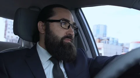 Sad businessman sitting in car, thinking about problems, feeling distressed 動画素材 117222553