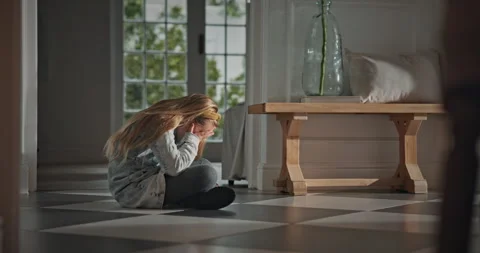Sad, child and crying on floor in home for bullying victim, emotional distress Stock Footage 337761492
