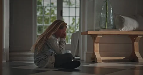 Sad, child and thinking on floor in home for emotional neglect, abandoned or Stock Footage 337760826