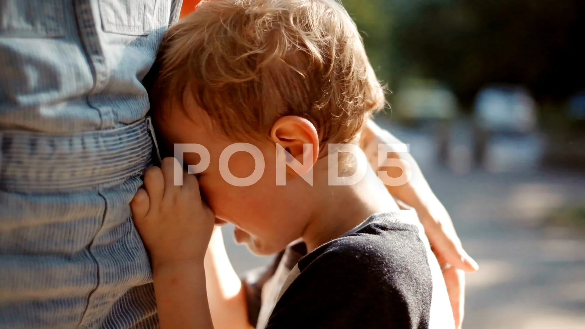 Sad child crying and hugging his mother.... | Stock Video | Pond5