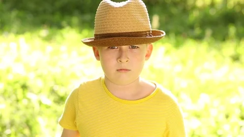 Sad child in a hat Stock Footage 78659437