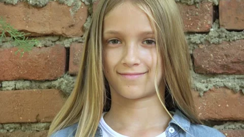 Sad Child Looking in Camera, Unhappy Girl Portrait, Depressed Bored Kid Face Stock Footage 345155422