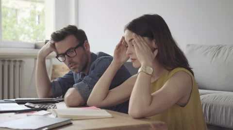 Sad couple counting bills, debt - financial problems concept Stock Footage 64653592