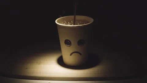 Sad cup filled with coffee bringing joy Video stock 221446249