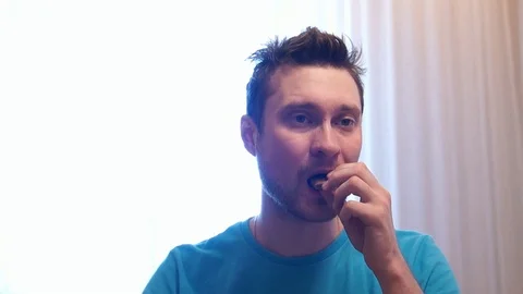 Sad, depressed man drinking tea Stock Footage 87016086