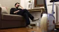 sad depressed man with headhache - dolly HD Footage