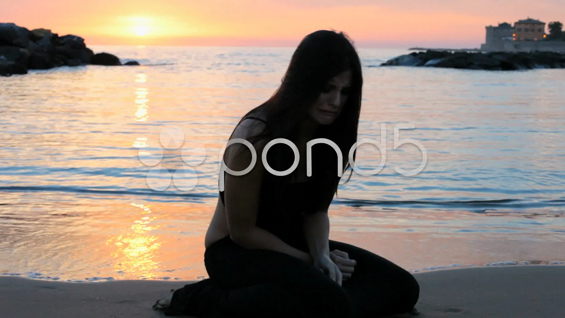 A sad girl crying on the beach - Hot mom A sad girl crying on the beach