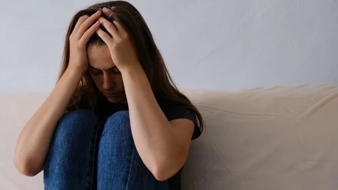 Sad depressed young woman feeling bad stressed worried anxious ashamed. Stock Footage