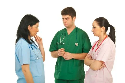 Sad doctors having conversation Stock Photos