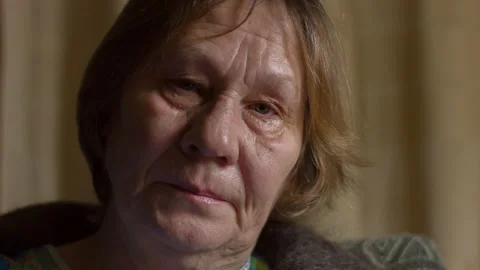 Sad elderly woman Stock Footage 142411100