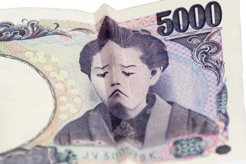 Sad face on Japanese bill Stock Photos