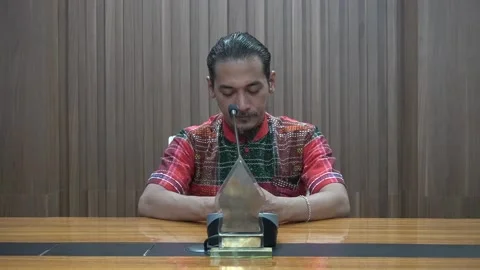 Sad, facing down of a man with a mustache Vídeos de archivo 221380075