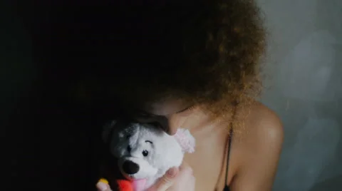 The sad girl embraces the bear Stock Footage 59234792