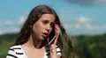 Sad girl talks on smartphone HD Footage