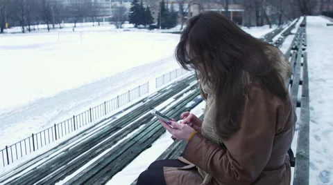 Sad girl typing a message Stock Footage 61375486