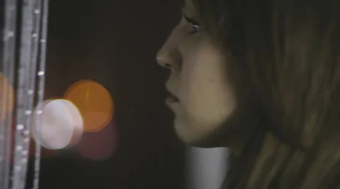 Sad girl at the window Stock-Footage 58583060