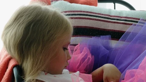 Sad girl by the window Video stock 124836394