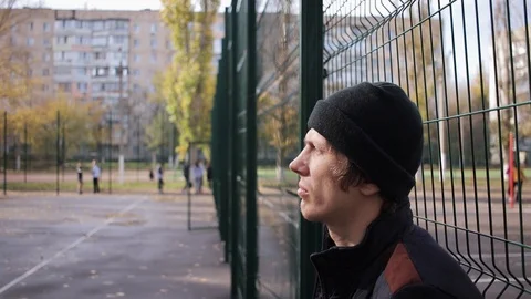 Sad guy with a cool plan. in the afternoon on the street 動画素材 125088701