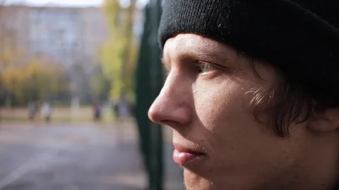 Sad guy with a cool plan. in the afternoon on the street Stock Footage 125088705