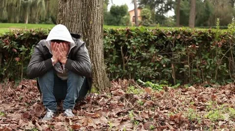 Sad guy at park Video stock 10580535
