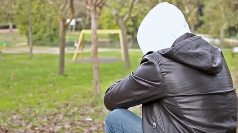 Sad guy at park Stock Footage 10583082