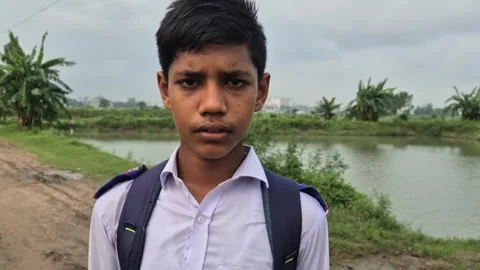 Sad High School Student With Backpack Standing On Rural Road Stock Footage 337597032