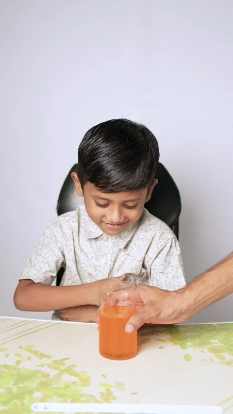 Sad Indian Boy Sitting at Table Stock Footage 341322703