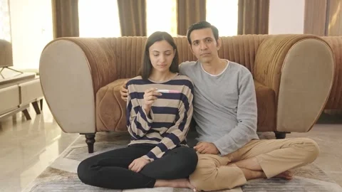 Sad Indian couple gets negative on pregnancy kit Stock Footage 242572168