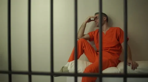 Sad inmate struggles in prison Stock Footage 59760272