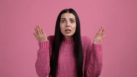 Sad lady startled message shout isolated pastel pink color background Stock Footage 165862504