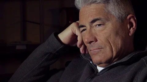 Sad lonely middle aged man sitting depressed deep in his thoughts Stock-Footage 74431029