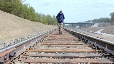 Sad lonely Teenager walks along the Stock Video Pond5