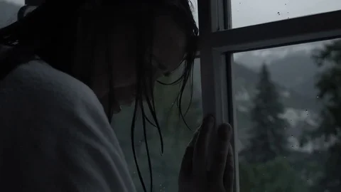 lonely girl in rain crying