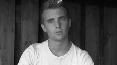 Sad looking young man Stock Footage 25787783