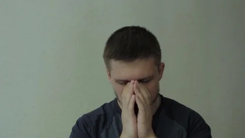 Sad man almost crying. Video stock 77324997