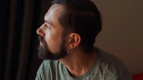 Sad man being a Victim looking directly in the camera Stock Footage 166817074