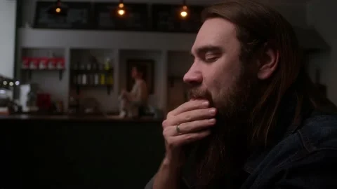 Sad man in a cafe Stock Footage 223884115