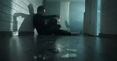 Sad man drinking alcohol. Depressed drunk person with addict. Mental health. Vídeo Stock 337955464