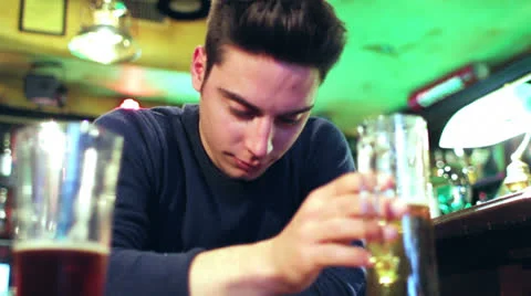 Sad man drinking beer Stock Footage 22621100