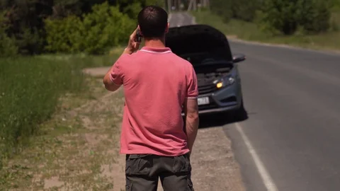 Sad Man Explains To Specialist Car Doesn't Work Stock Footage 97112196