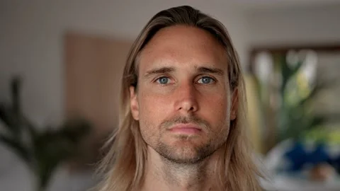 Sad man face portrait close up. Upset guy look camera. Male person long hair usa Stock Footage 236697722
