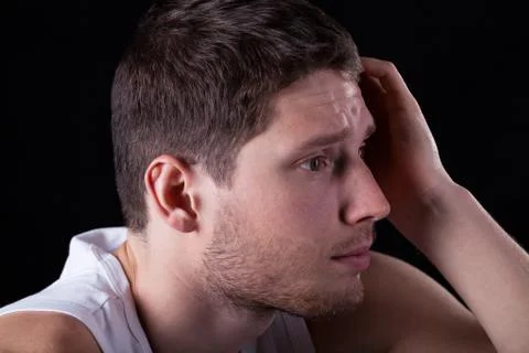 Sad man on isolated background 库存照片