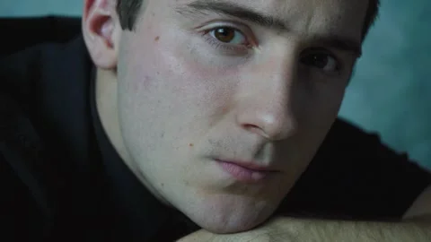 Sad man looking at the camera Stock Footage 145924477