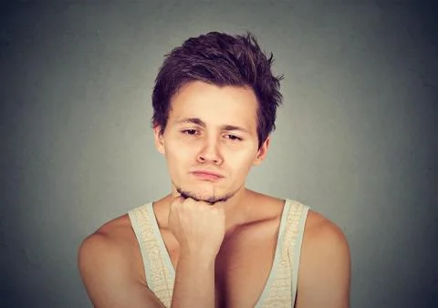 Sad man looking down has no motivation in life depressed Stock Photos