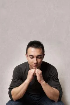 Sad man looking down Stock Photos