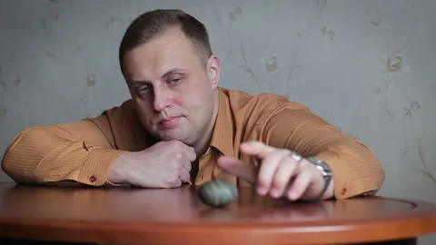 A sad man with problems thinks about something Stock Footage 87956500