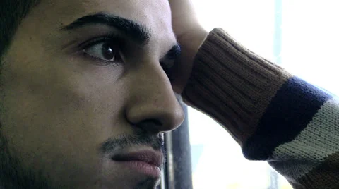 Sad man riding on a train Stock Footage 34273717