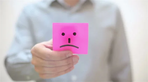 Sad. A man sticks a note on transparent screen Stock Footage 67829932