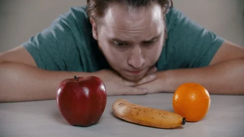 Sad man is taking out a cake Stock Footage 118472643