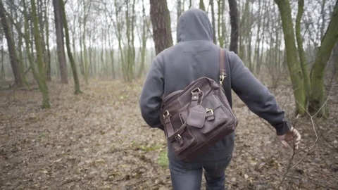 Sad man walking by forest Stock-Footage 71955462